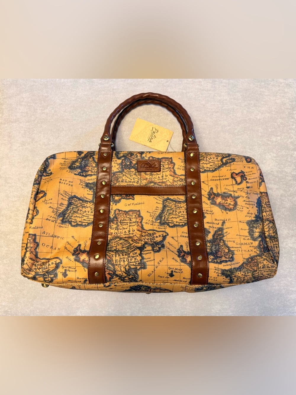 Patricia Nash Milano Weekender Duffel Bag, map print, leather trim & brass studs